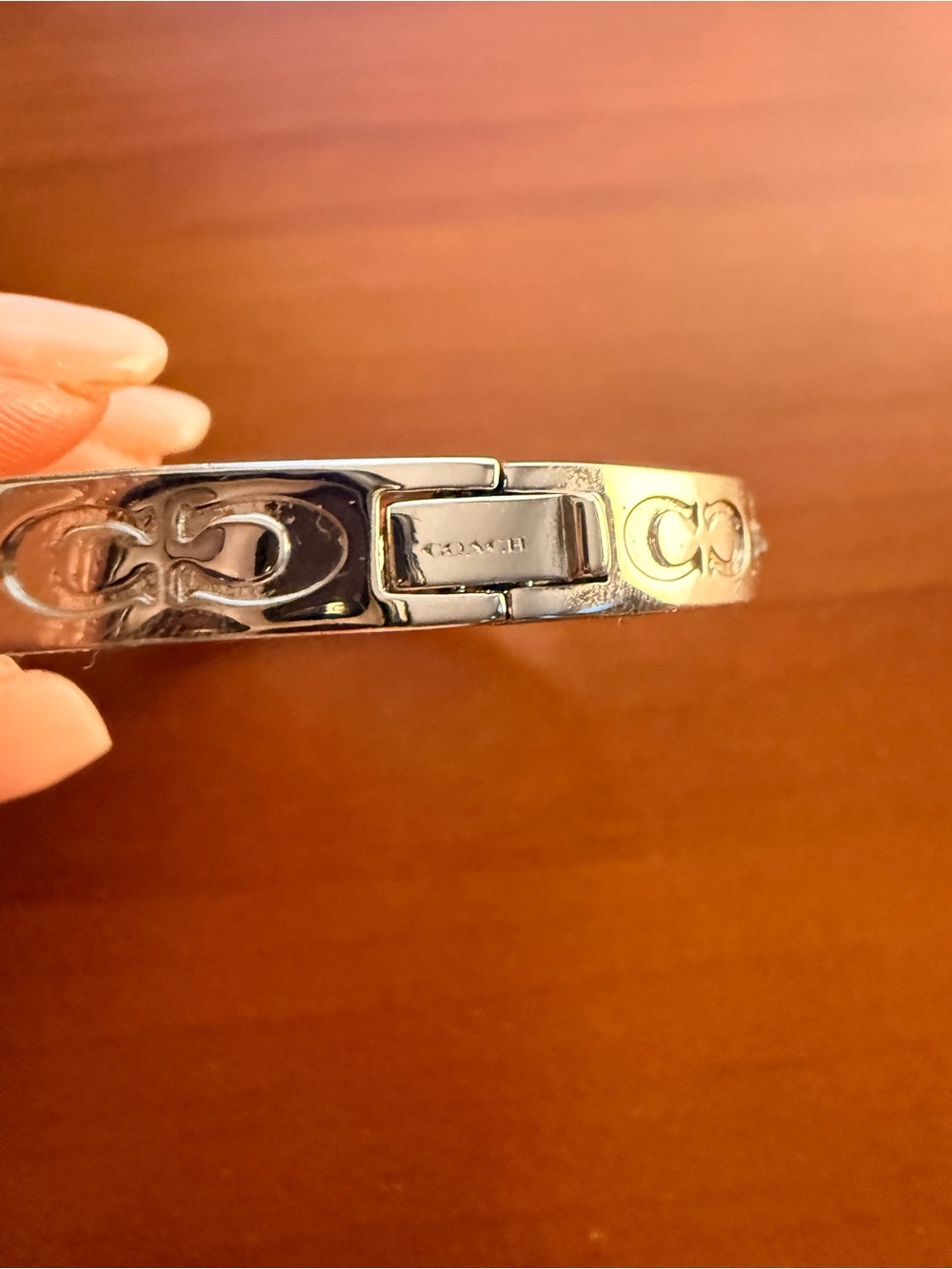 Coach Silver-Tone Logo Bangle with Crystal Accents - Picture 4 of 5